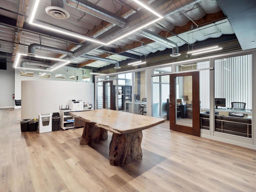 8945 Research Drive Irvine, CA 92618 - Photo 27 of 59 a dining hall with stainless steel appliances granite countertop a stove and cabinets