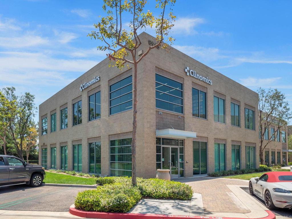 8945 Research Drive Irvine, CA 92618 - Photo 3 of 59 a view of a brick building next to a yard