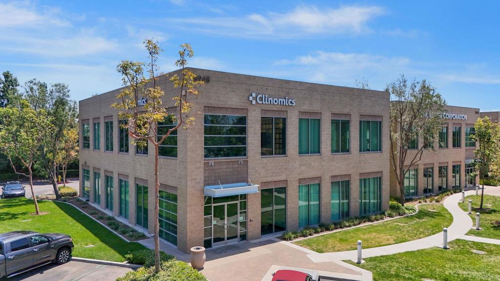 8945 Research Drive Irvine, CA 92618 - Photo 40 of 59 a front view of a house with a yard