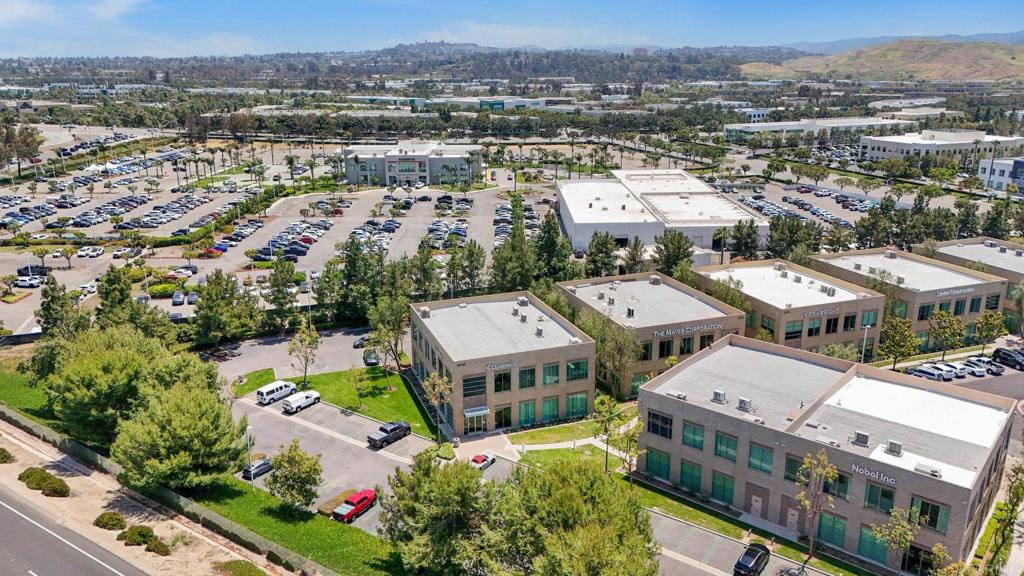 8945 Research Drive Irvine, CA 92618 - Photo 49 of 59 an aerial view of a house with a lake view