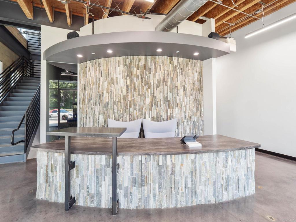 8945 Research Drive Irvine, CA 92618 - Photo 5 of 59 a view of a porch with a table and chairs