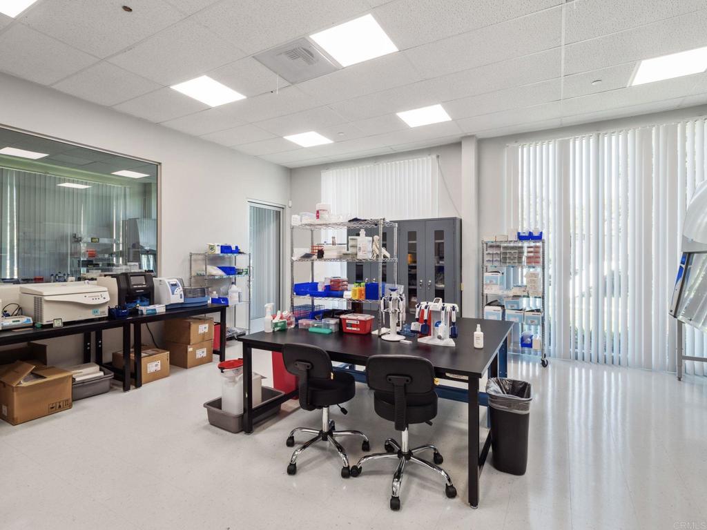 8945 Research Drive Irvine, CA 92618 - Photo 8 of 59 a view of a workspace with furniture and a livingroom