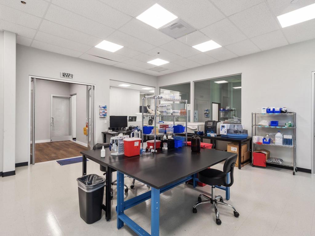 8945 Research Drive Irvine, CA 92618 - Photo 9 of 59 a view of a dining room with furniture and wooden floor
