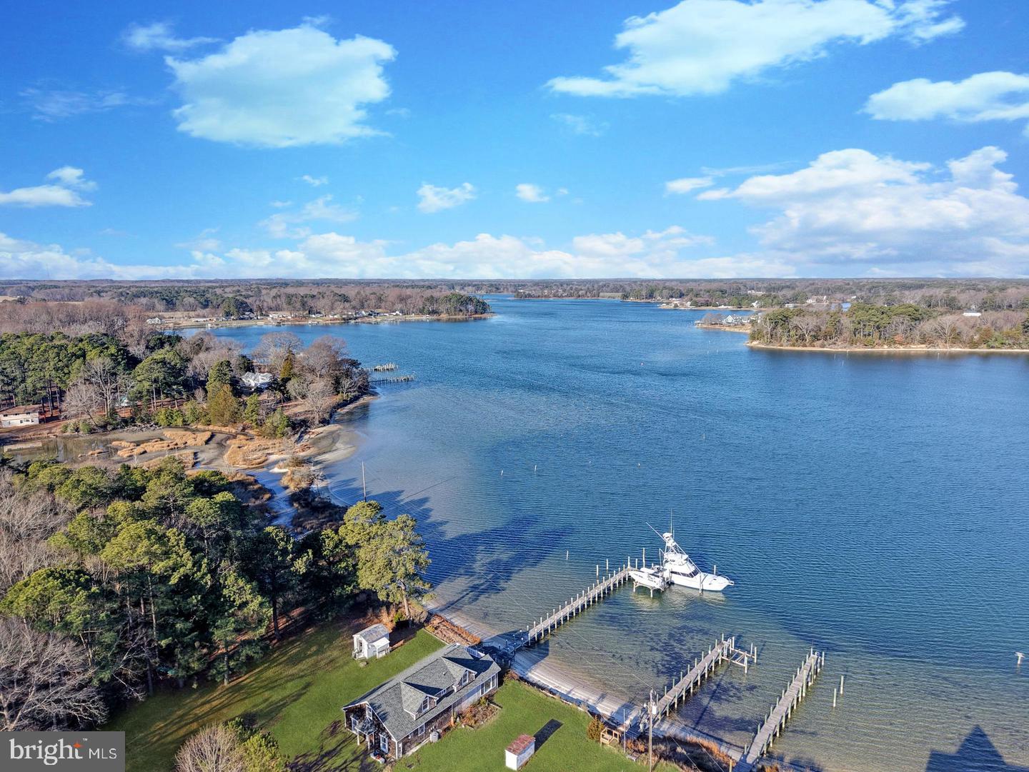2755 Sunnybank Road Reedville, VA 22539 - Photo 49 of 57 Serene waterfront view with lush greenery.