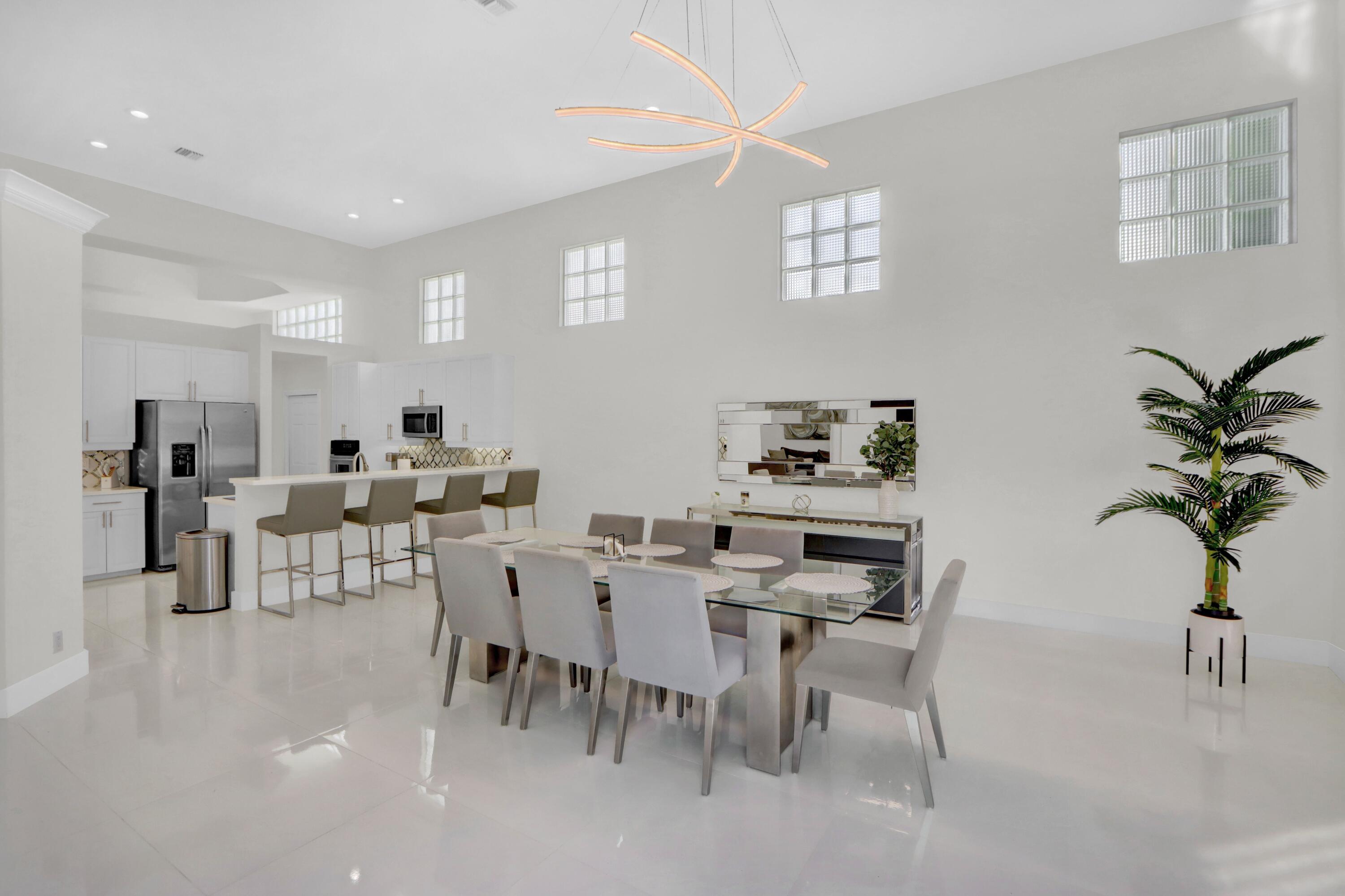 6564 Somerset Circle Boca Raton, FL 33496 - Photo 8 of 39 a view of a dining room with furniture