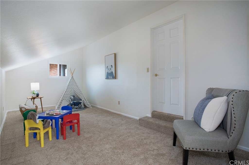 15832 Monroe Street Westminster, CA 92683 - Photo 12 of 32 a living room with furniture and a couch