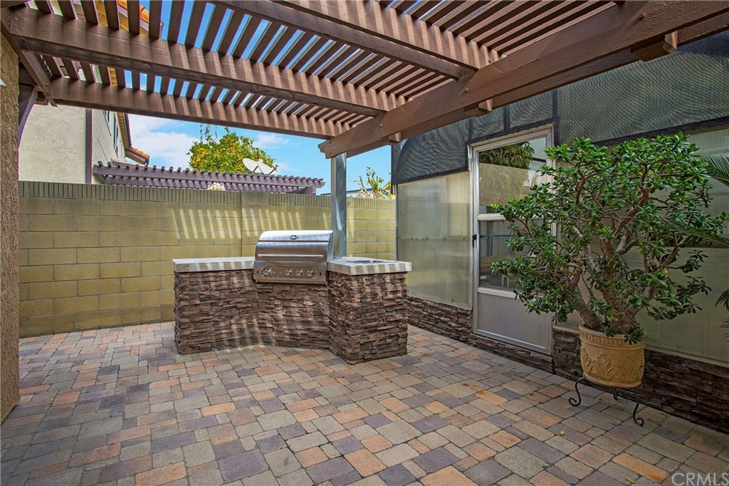 15832 Monroe Street Westminster, CA 92683 - Photo 25 of 32 a front view of a house with a garden