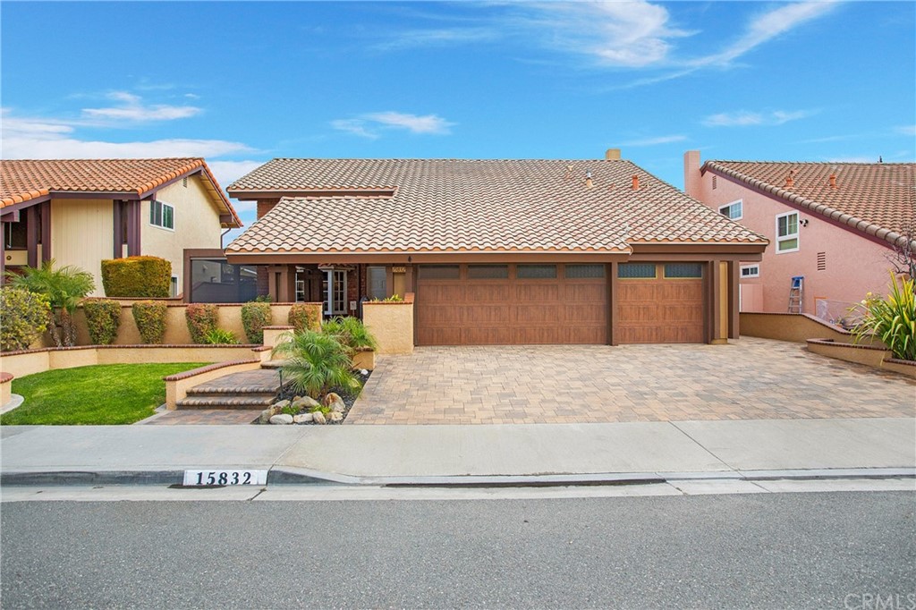 15832 Monroe Street Westminster, CA 92683 - Photo 32 of 32 a front view of a house with a garden and yard