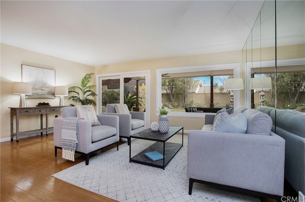 15832 Monroe Street Westminster, CA 92683 - Photo 6 of 32 a living room with furniture and a large window