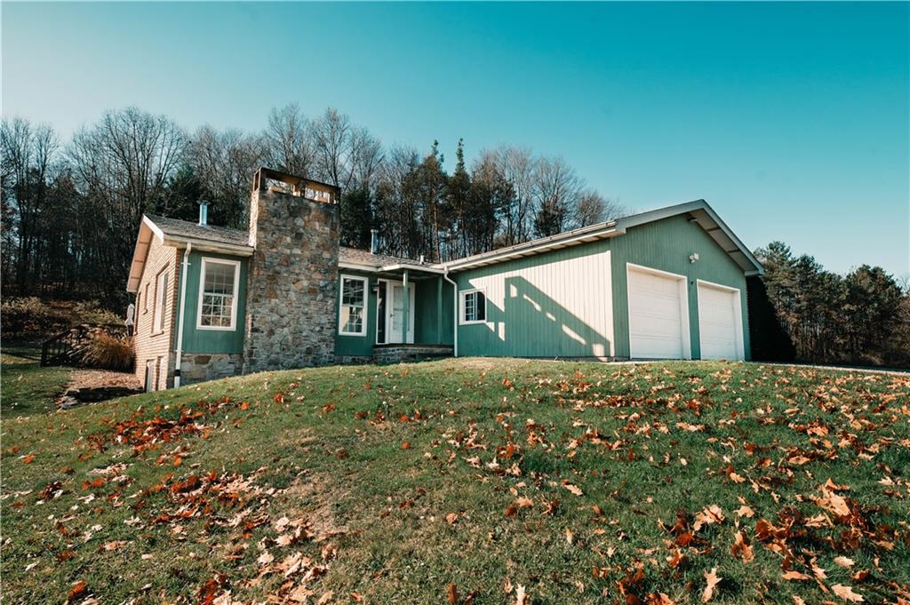 2555 Morrow Road Home, PA 15747 - Photo 1 of 24 front view of a house with a yard