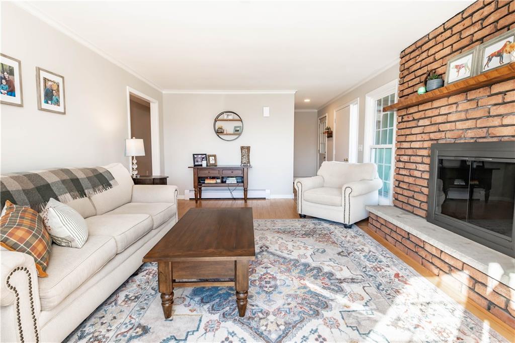 2555 Morrow Road Home, PA 15747 - Photo 3 of 24 a living room with furniture and a fireplace