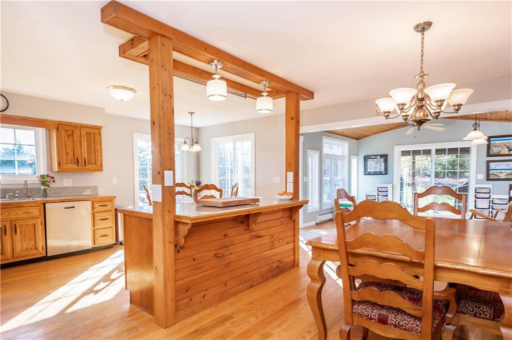 2555 Morrow Road Home, PA 15747 - Photo 4 of 24 a view of a dining room with furniture a chandelier and wooden floor