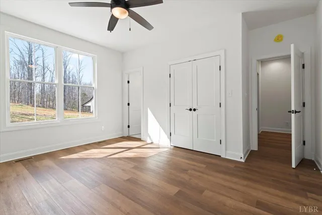 a view of wooden floor in a bathroom