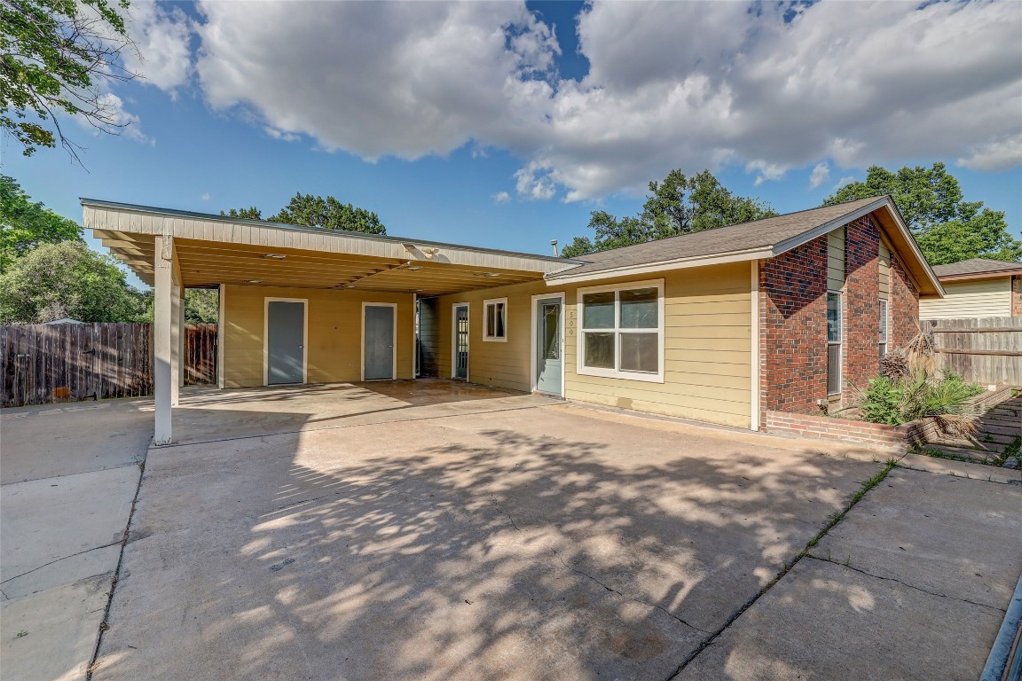 500 Bramble Drive Austin, TX 78745 - Photo 1 of 1 a view of a house with a backyard