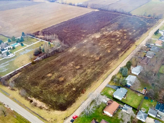 a view of swimming pool from a yard