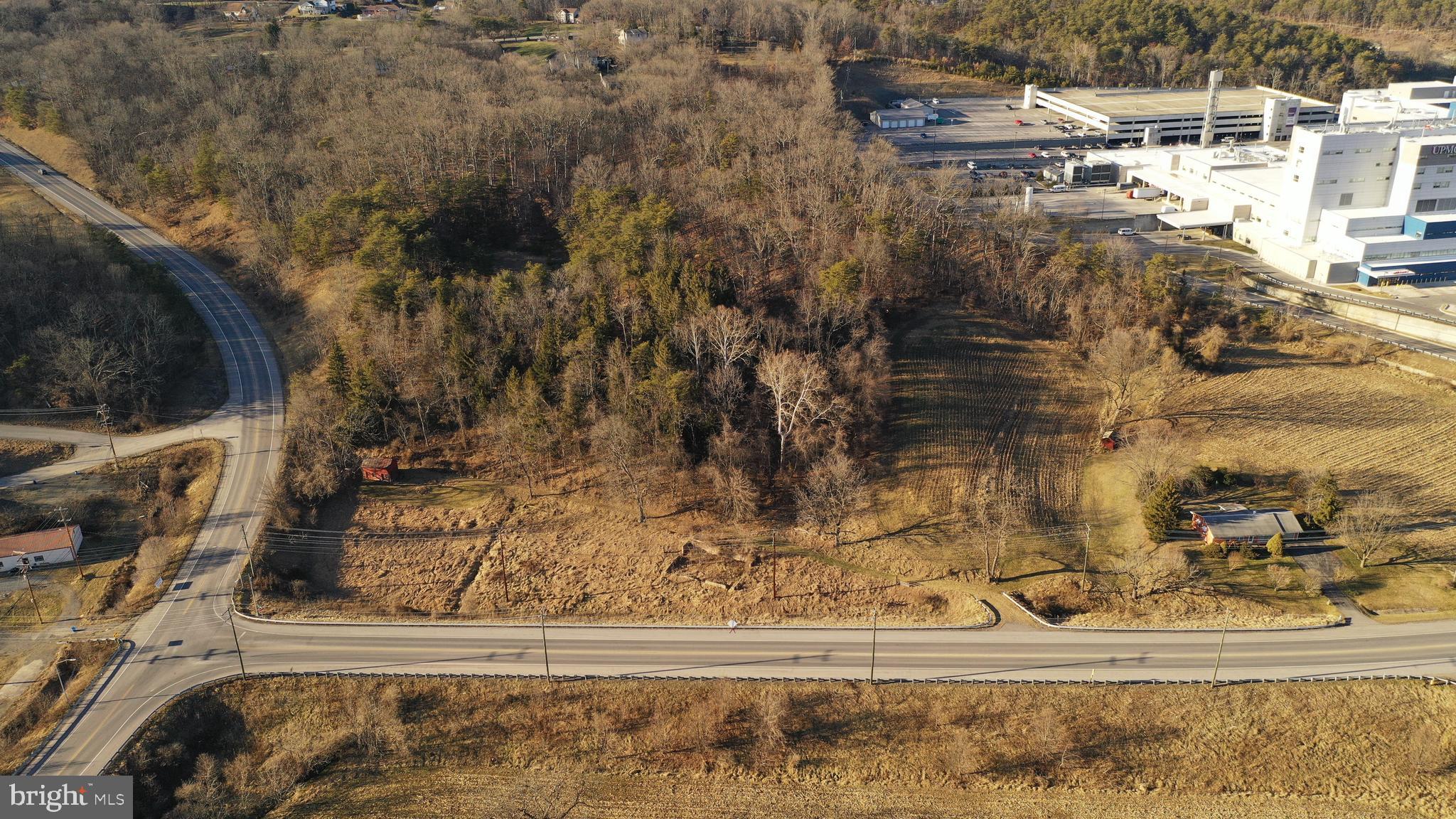 12528 Willowbrook Road Cumberland, MD 21502 - Photo 4 of 5 a view of a house with a yard