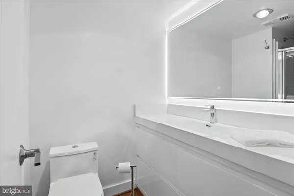 a bathroom with a sink and a toilet