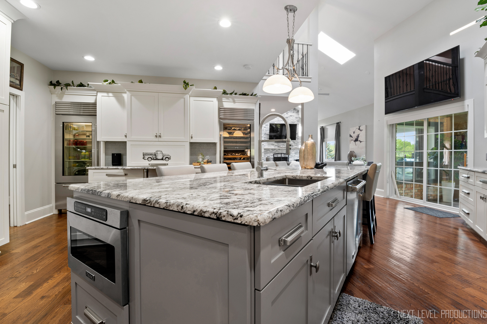 39-w068 Seavey Road Batavia, IL 60510 - Photo 15 of 109 a kitchen with stainless steel appliances granite countertop a stove and a wooden floors