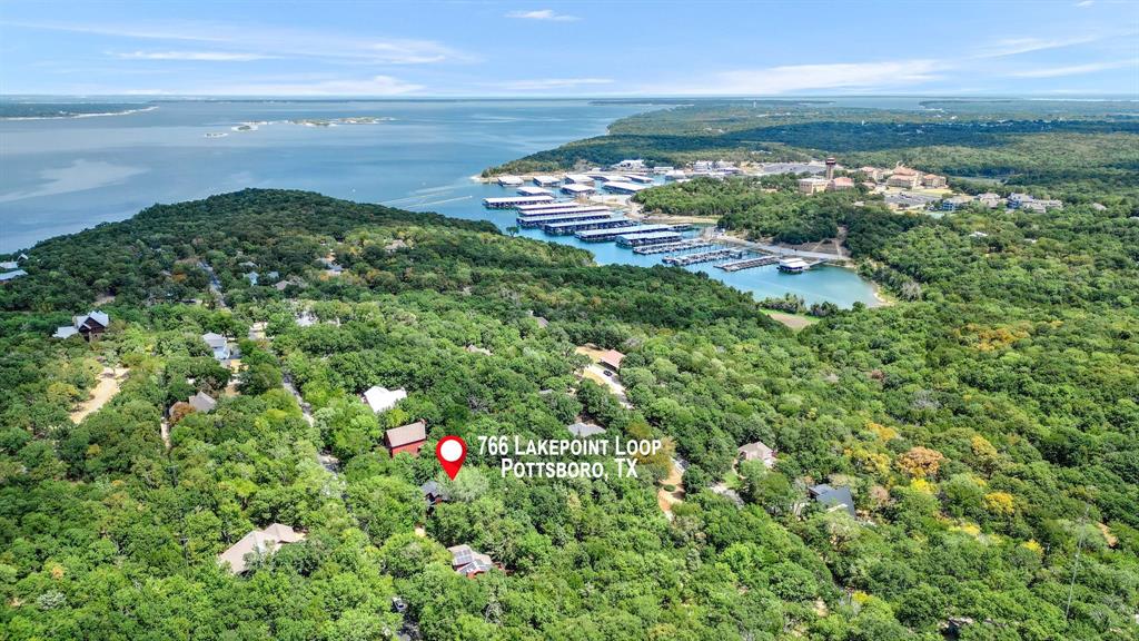766 Lakepoint Loop Pottsboro, TX 75076 - Photo 2 of 33 a view of a lake