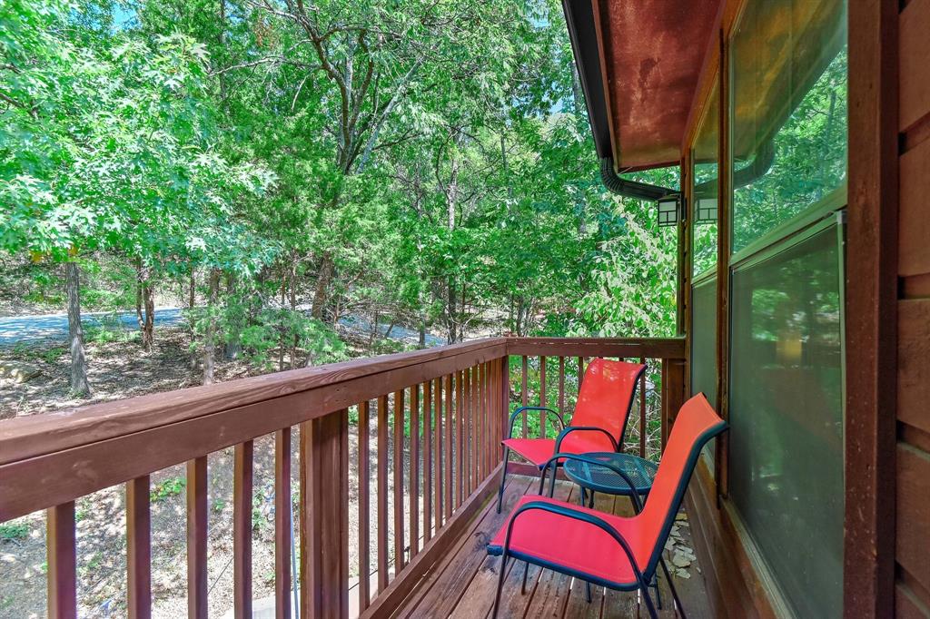 766 Lakepoint Loop Pottsboro, TX 75076 - Photo 23 of 33 a view of a two chairs in the balcony