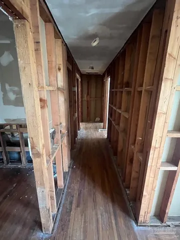a view of entryway with wooden floor