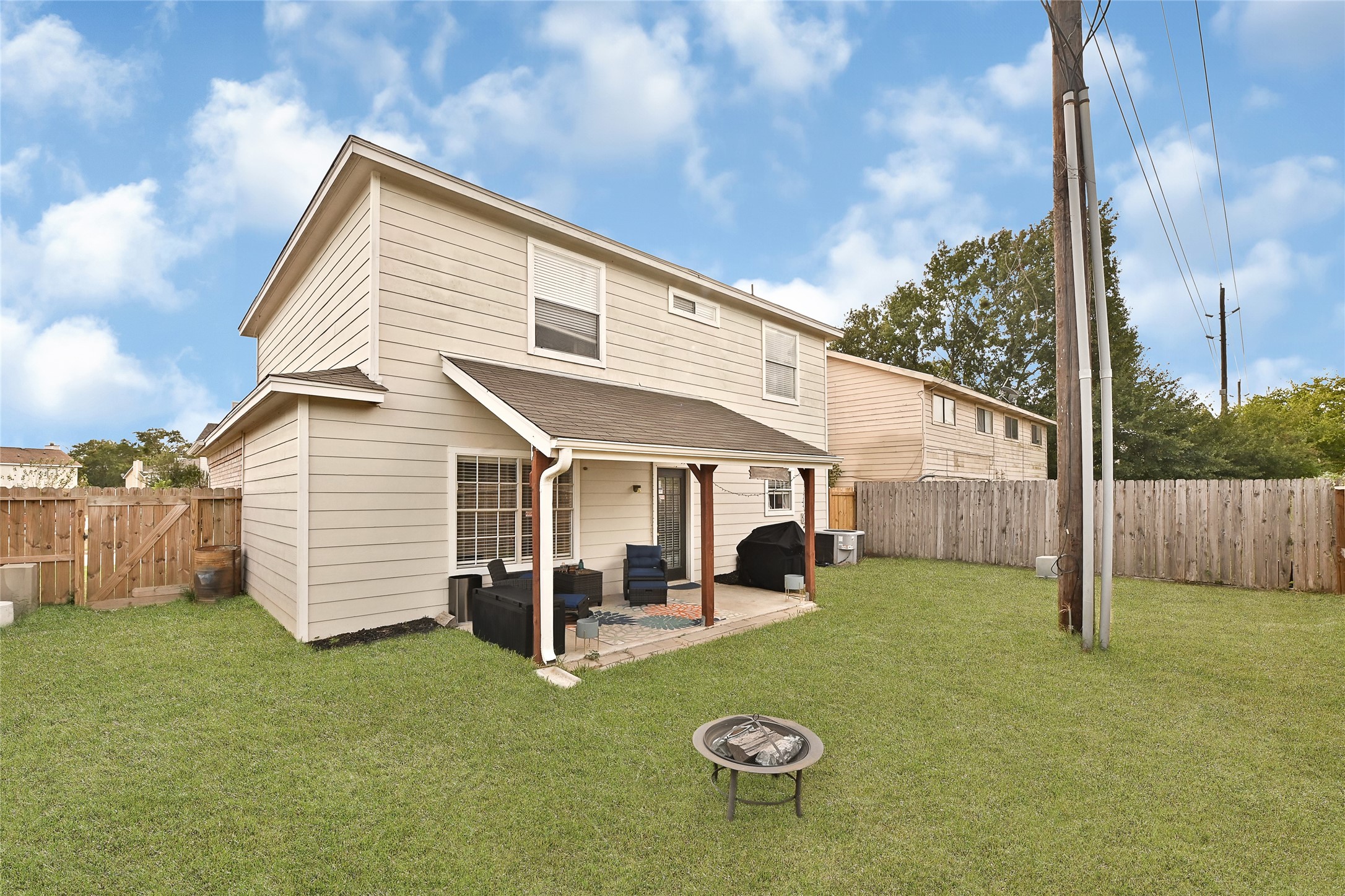 10100 Spring Pl Drive Houston, TX 77070 - Photo 23 of 24 Expansive backyard with plenty of space for outdoor activities and gatherings.
