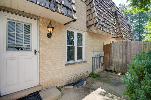 a front view of a house with a garage
