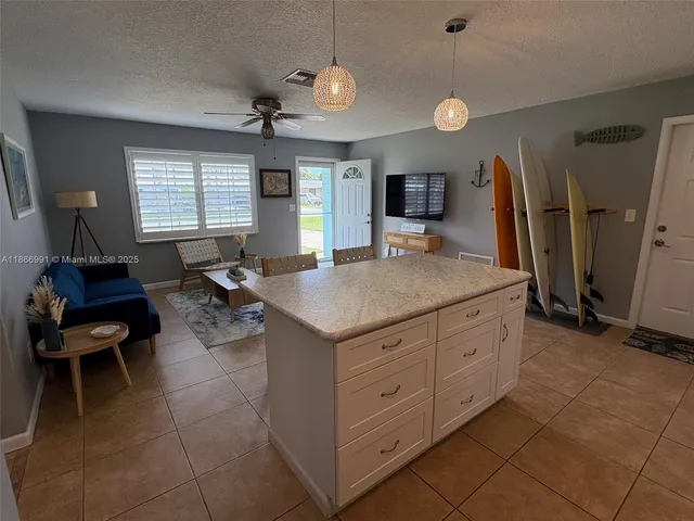 a view of a livingroom and dining room