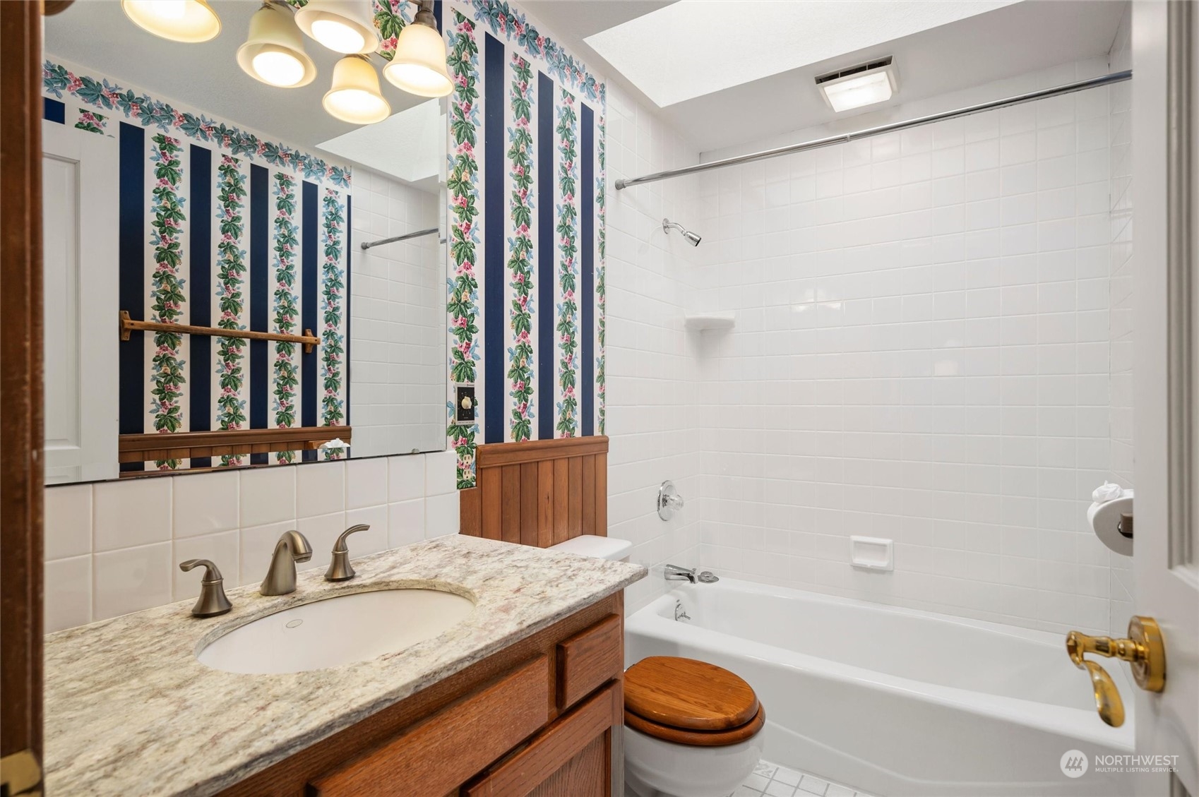 13595 Avon Allen Road Mount Vernon, WA 98273 - Photo 24 of 37 a bathroom with a granite countertop bathtub shower sink vanity and a toilet