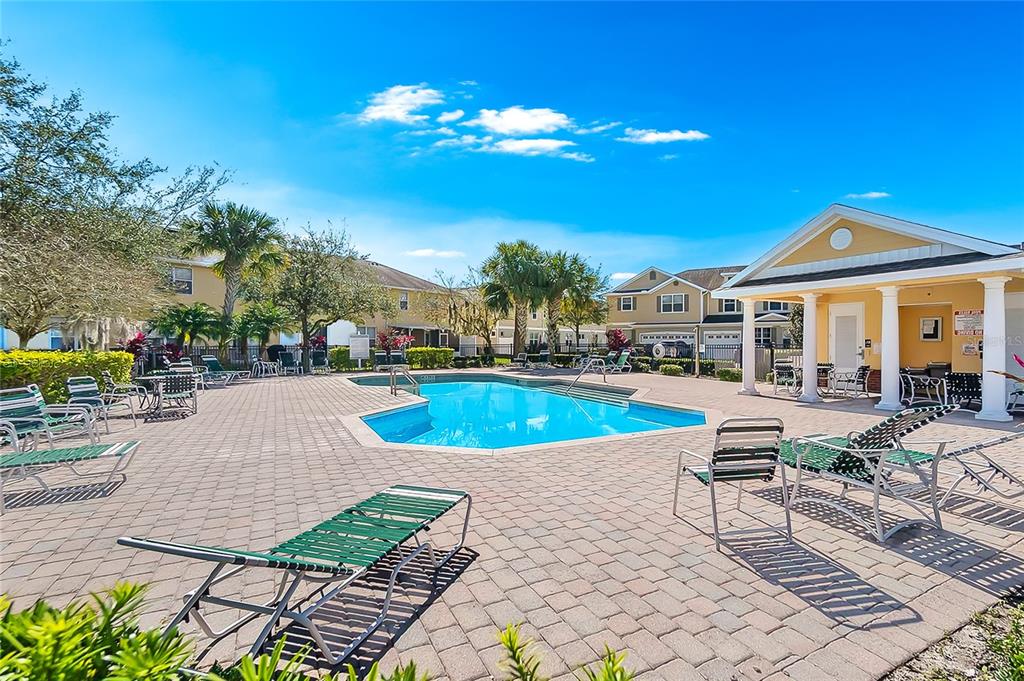 4824 Poolside Drive St. Cloud, FL 34769 - Photo 28 of 29 a view of a house with swimming pool and sitting area