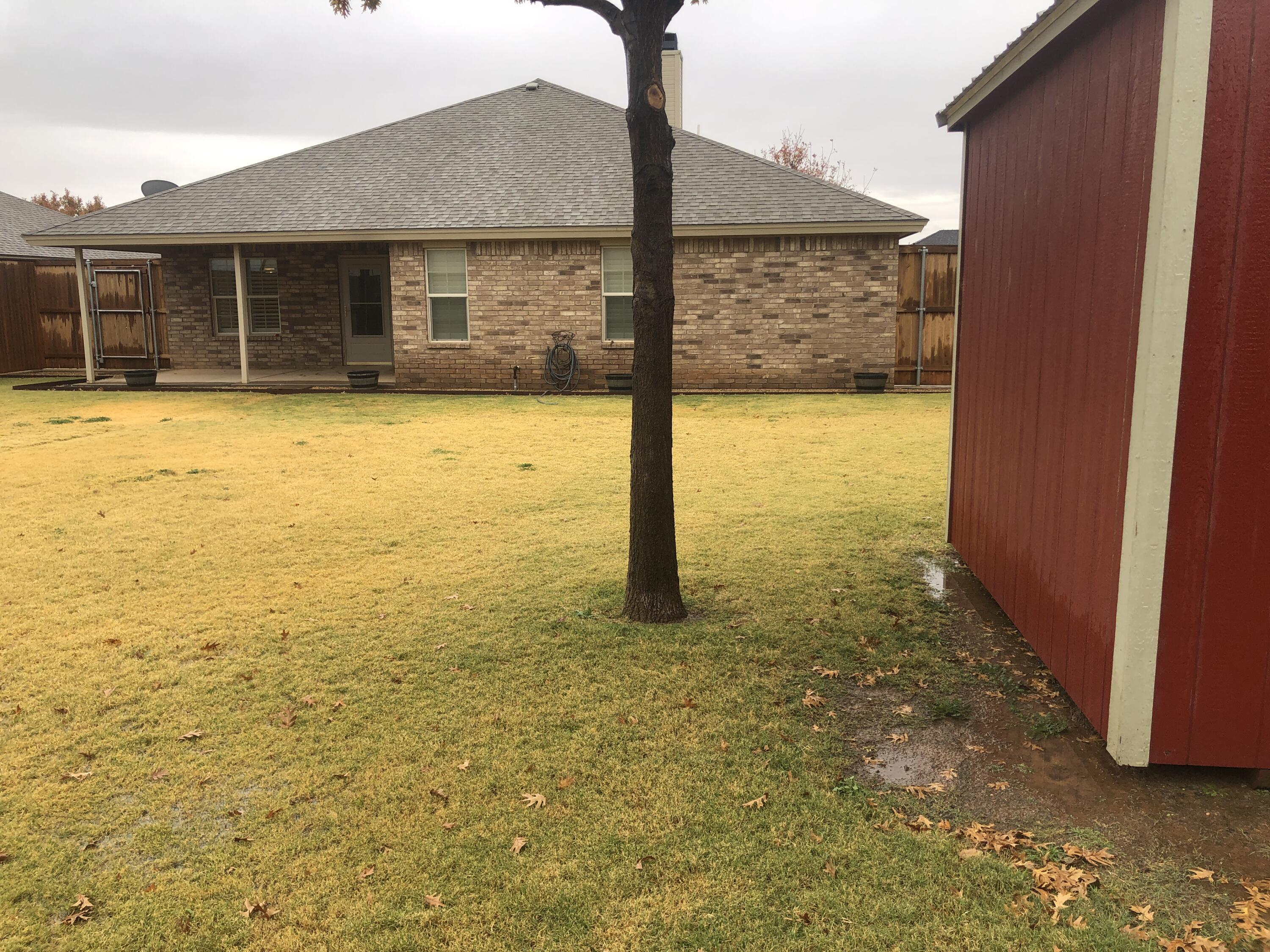 7528 84th Street Lubbock, TX 79424 - Photo 19 of 20 a view of a backyard of house
