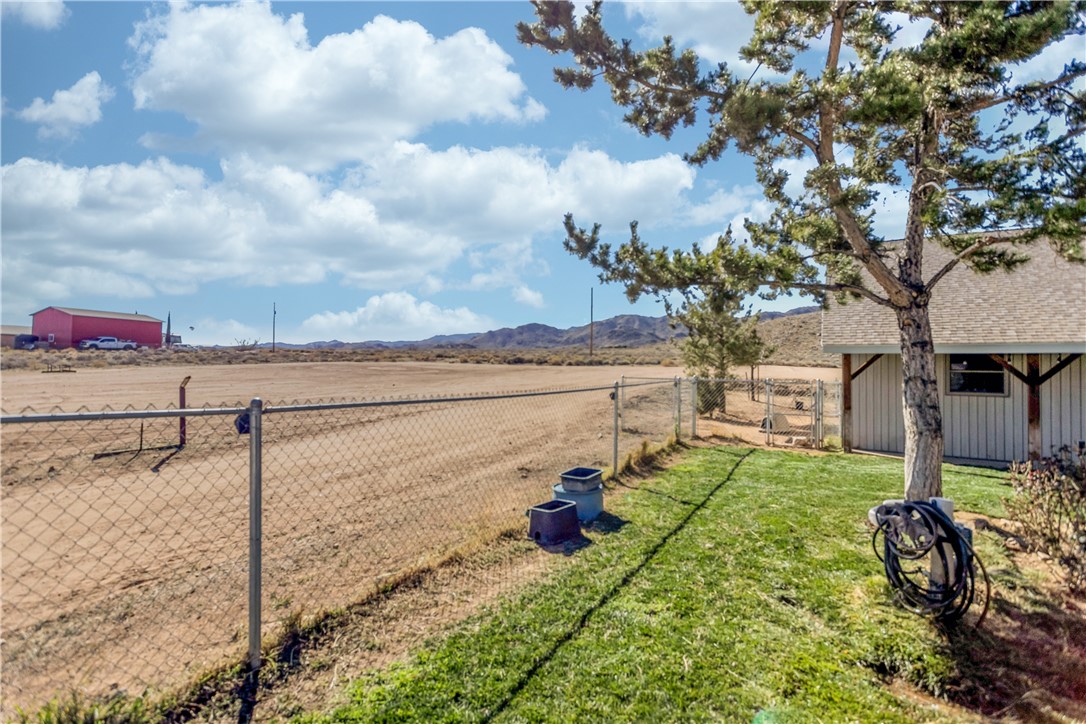 2646 East Ferguson Ranch Road Kingman, AZ 86409 - Photo 36 of 53 View of yard featuring a mountain view