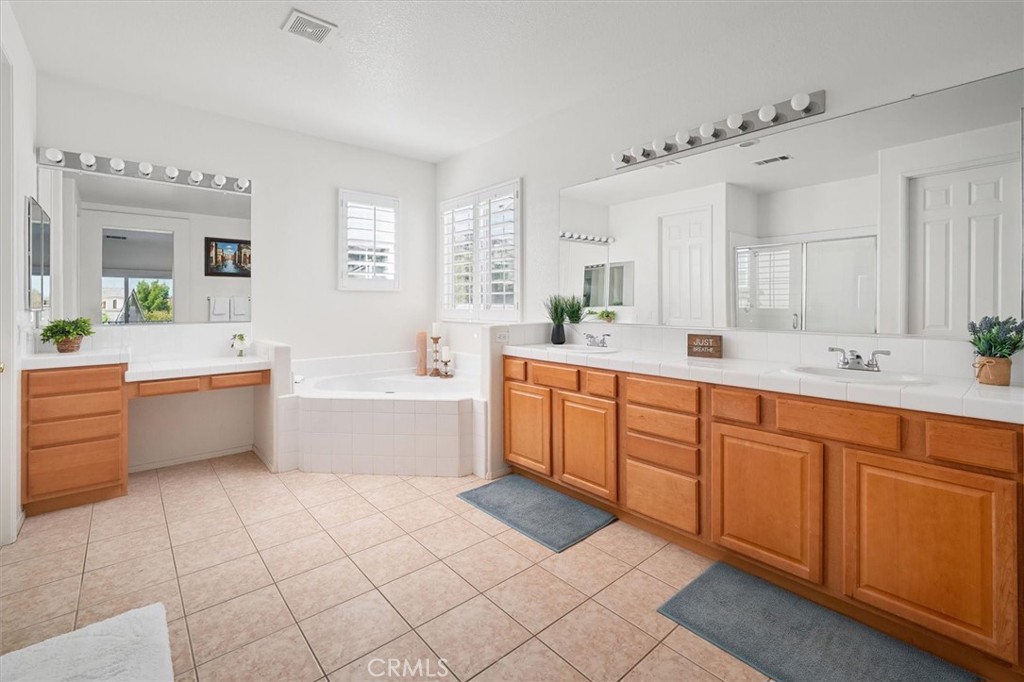 29370 Las Brisas Road Valencia, CA 91354 - Photo 35 of 57 Your Private Retreat
Dual sinks, vanity area, soaking tub, spacious walk-in shower and an oversized walk-in closet.