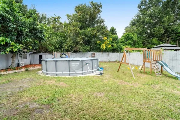 a view of a swimming pool with a patio