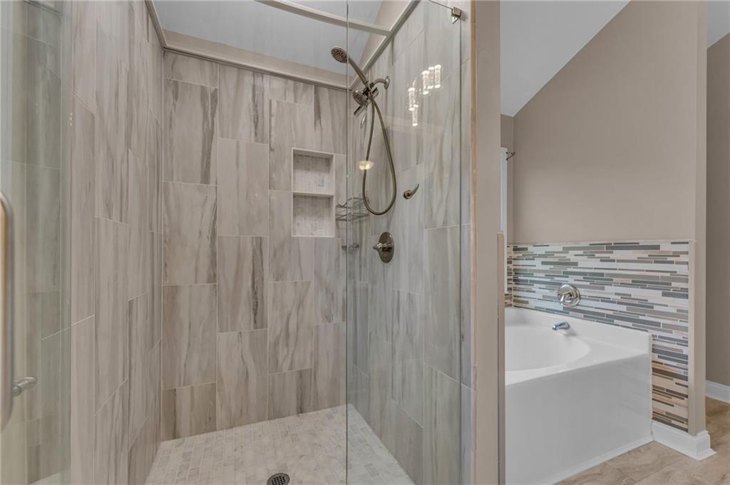 1093 3rd Street Stone Mountain, GA 30083 - Photo 19 of 43 a bathroom with a shower and a sink