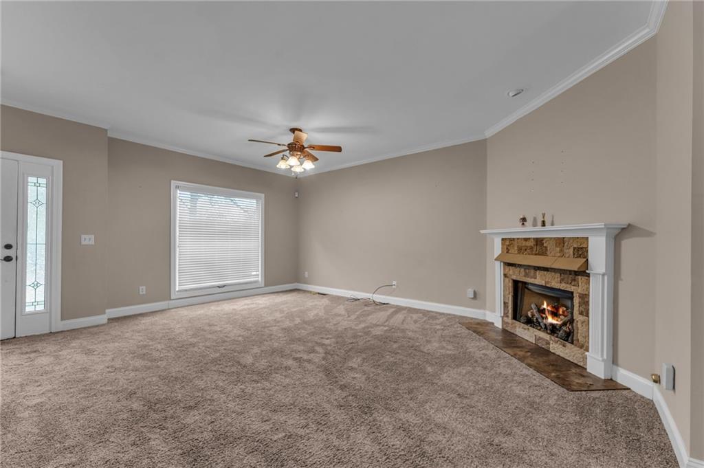 1093 3rd Street Stone Mountain, GA 30083 - Photo 2 of 43 a view of an empty room with a fireplace