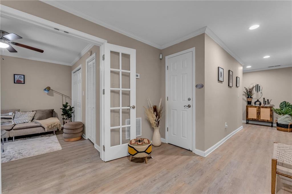 1093 3rd Street Stone Mountain, GA 30083 - Photo 29 of 43 a living room with furniture and a wooden floor