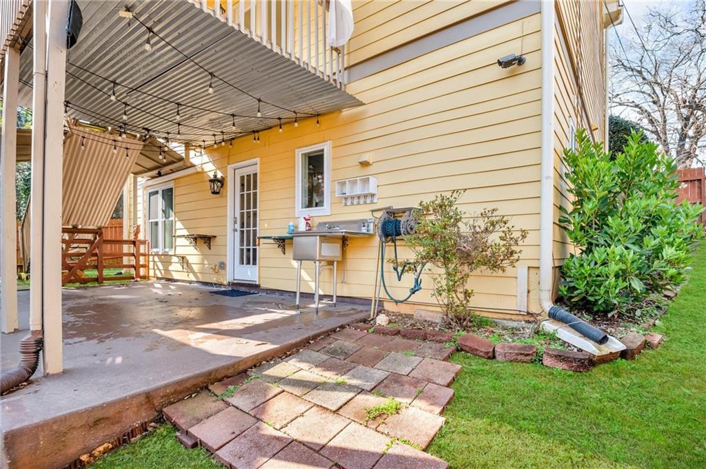 1093 3rd Street Stone Mountain, GA 30083 - Photo 42 of 43 a view of a backyard with a patio