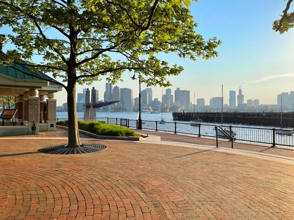 a swimming pool with outdoor seating and yard