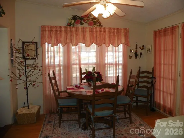 a kitchen with stainless steel appliances a sink and a refrigerator