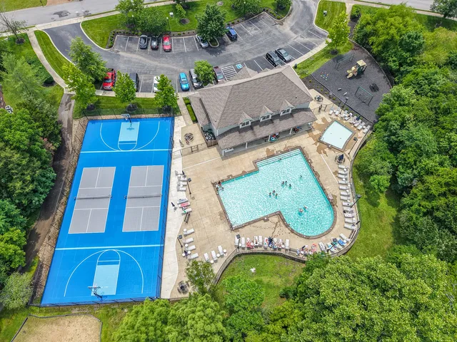 an aerial view of a house having swimming pool garden and patio