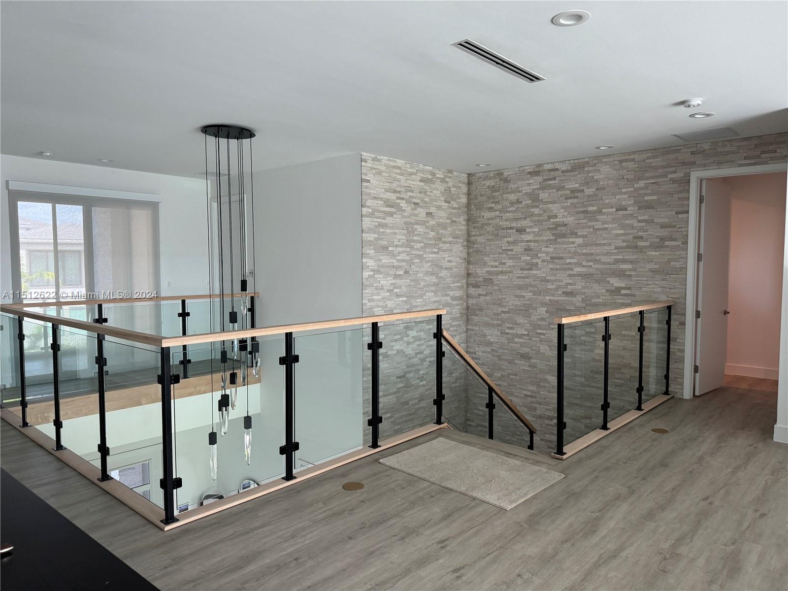 8636 Dearborn River Way Boca Raton, FL 33496 - Photo 17 of 25 a view of an entryway with wooden floor