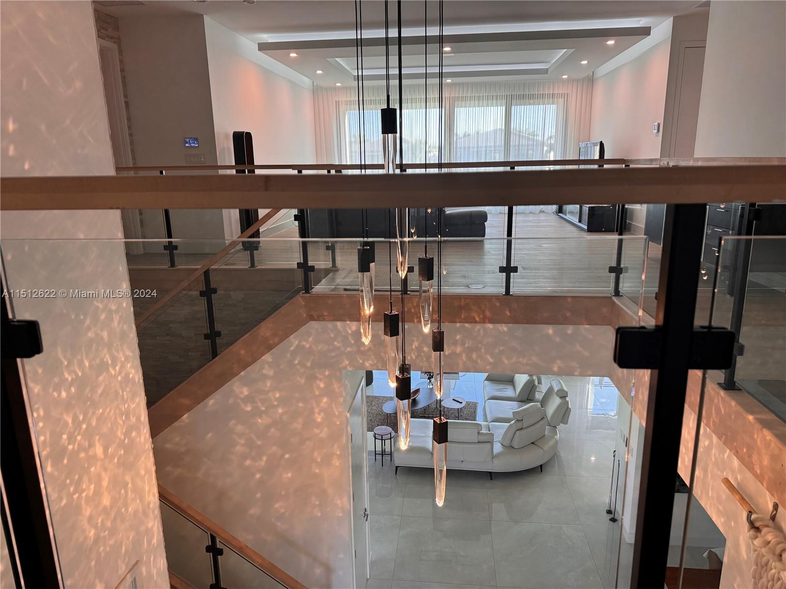 8636 Dearborn River Way Boca Raton, FL 33496 - Photo 19 of 25 a living room with furniture and a flat screen tv