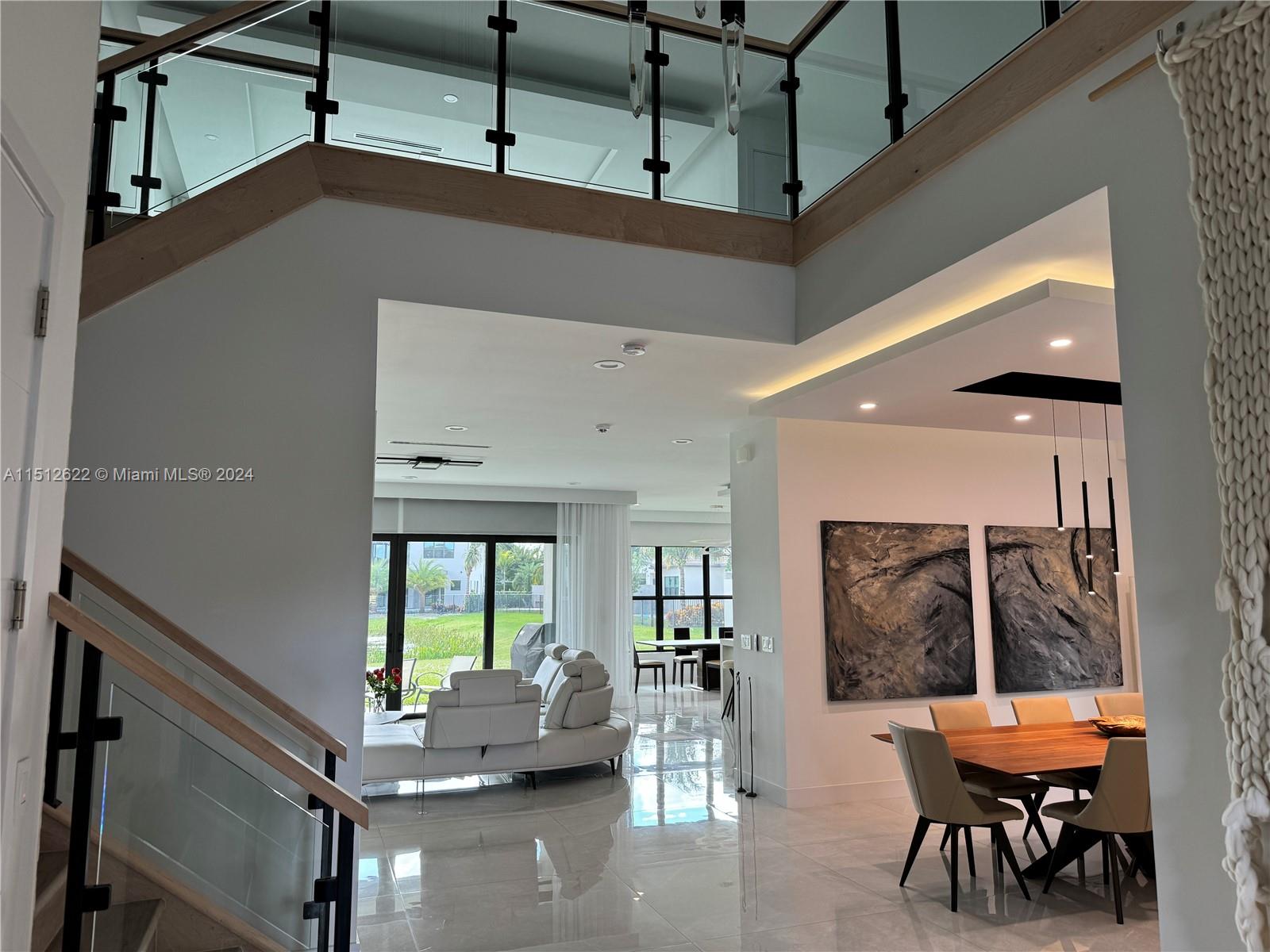 8636 Dearborn River Way Boca Raton, FL 33496 - Photo 3 of 25 a living room with furniture