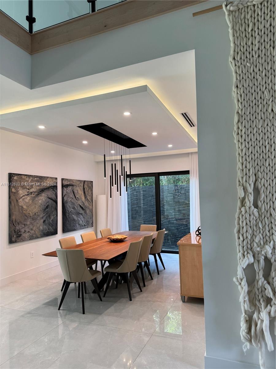 8636 Dearborn River Way Boca Raton, FL 33496 - Photo 5 of 25 a view of a dining room with furniture window and outside view