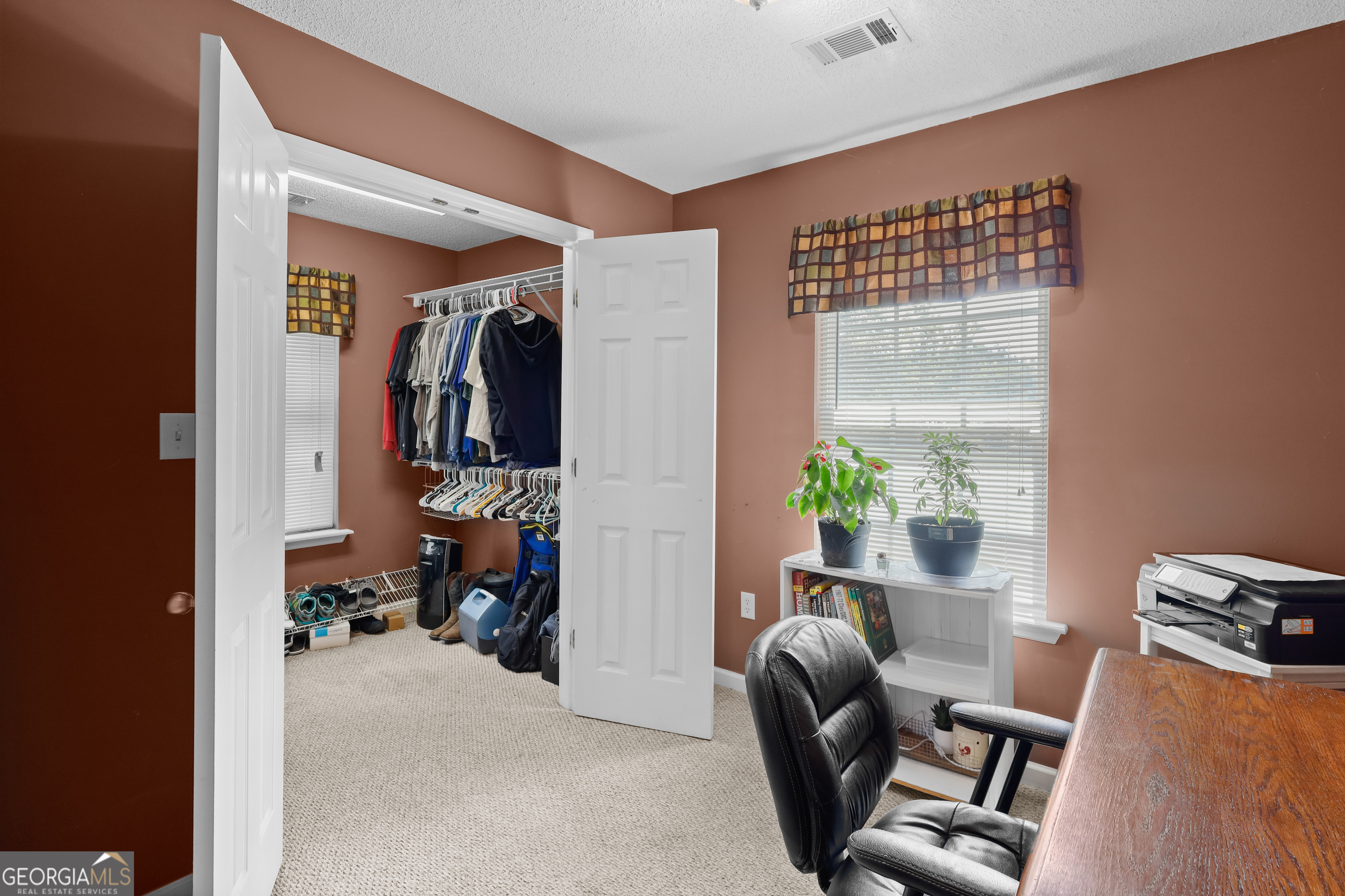 136 Quail Knoll Road Danville, GA 31017 - Photo 20 of 49 a view of a livingroom with furniture and a window