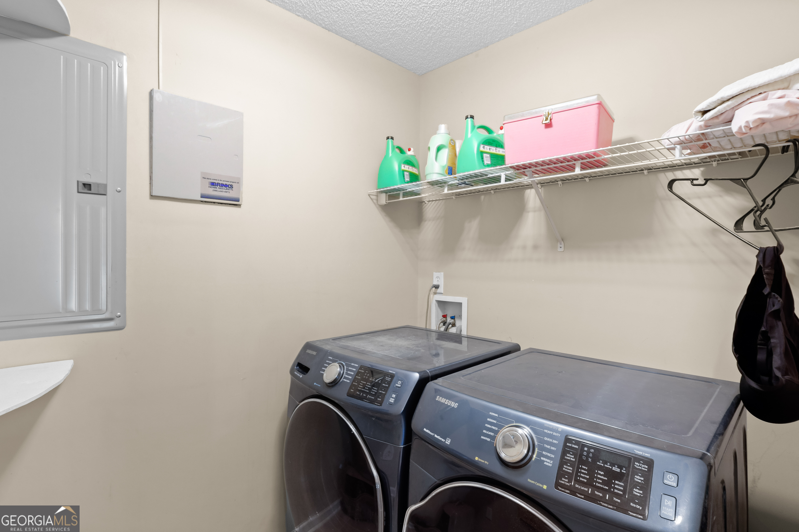 136 Quail Knoll Road Danville, GA 31017 - Photo 33 of 49 a utility room with dryer and washer