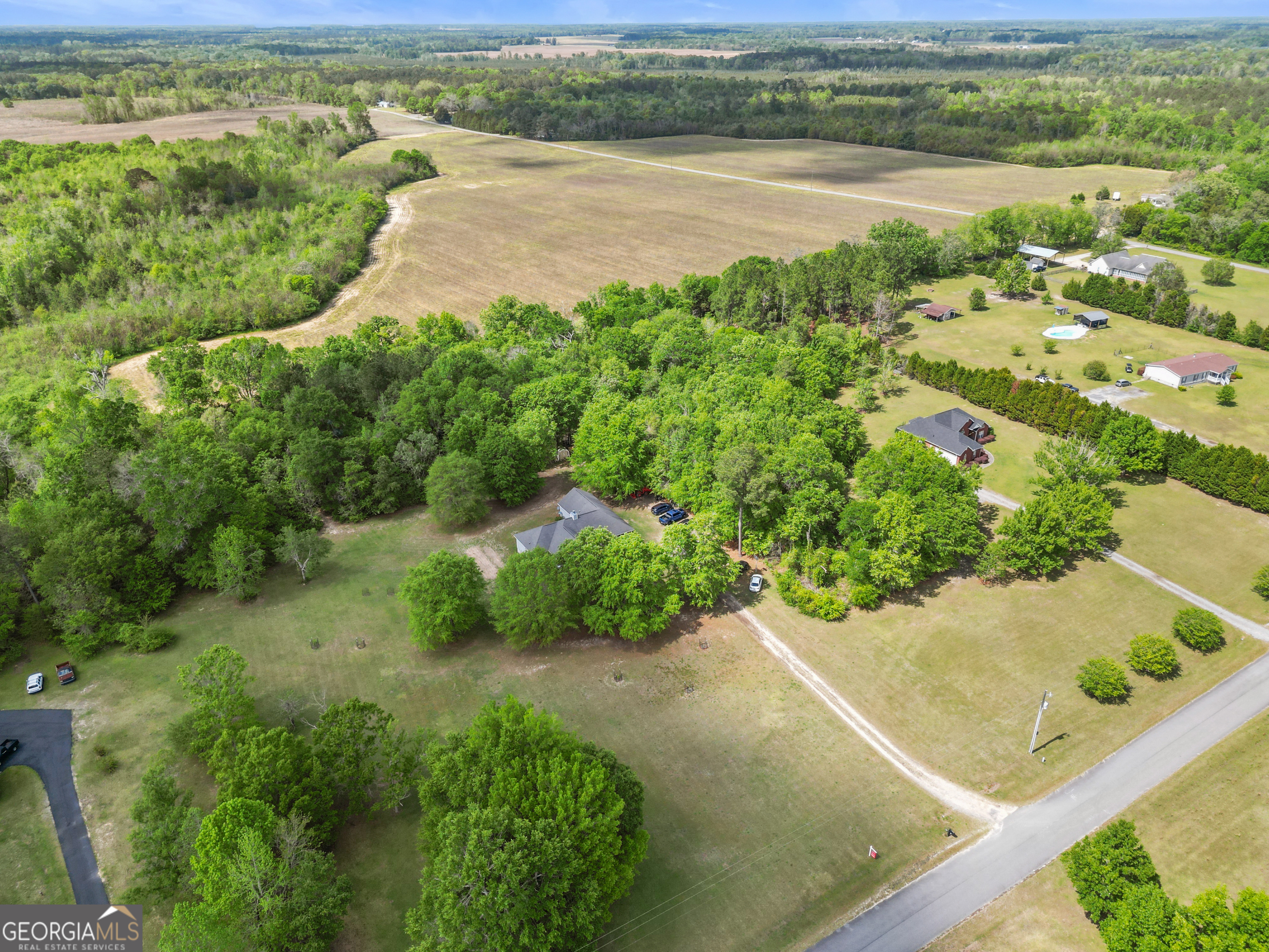 136 Quail Knoll Road Danville, GA 31017 - Photo 41 of 49 an aerial view of residential houses with outdoor space and river