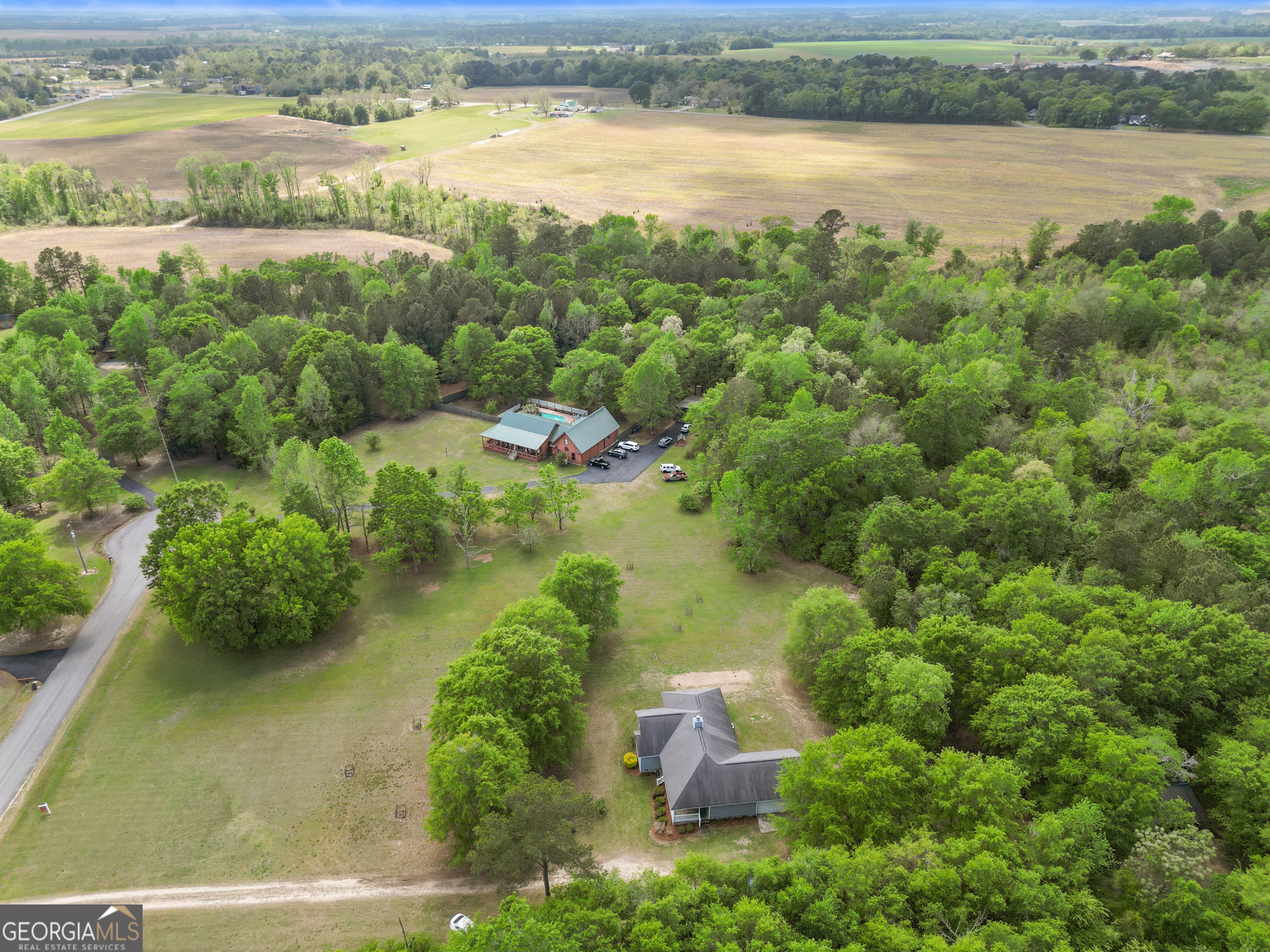 136 Quail Knoll Road Danville, GA 31017 - Photo 42 of 49 an aerial view of ocean with residential house and outdoor space