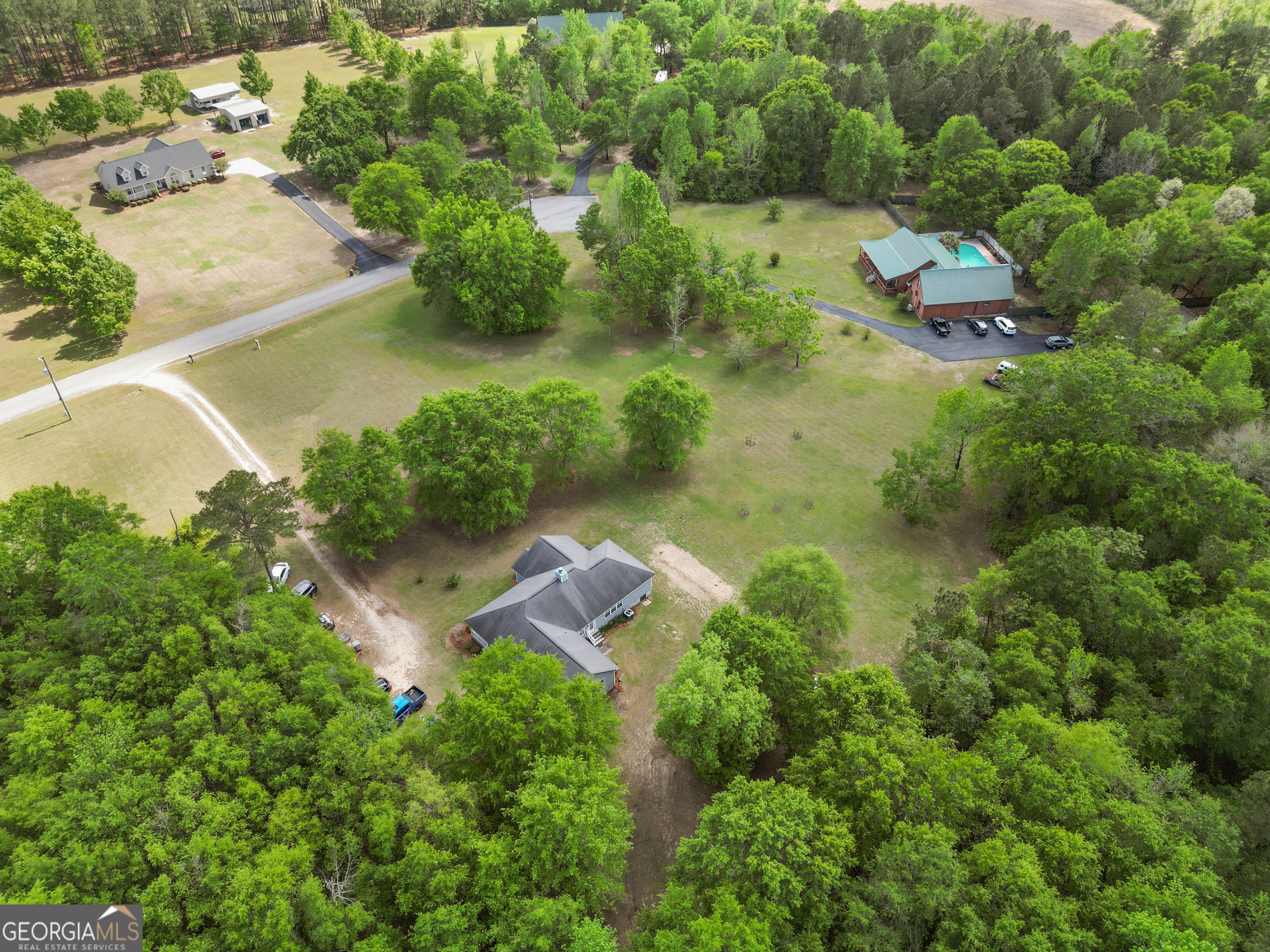 136 Quail Knoll Road Danville, GA 31017 - Photo 43 of 49 an aerial view of residential house with outdoor space